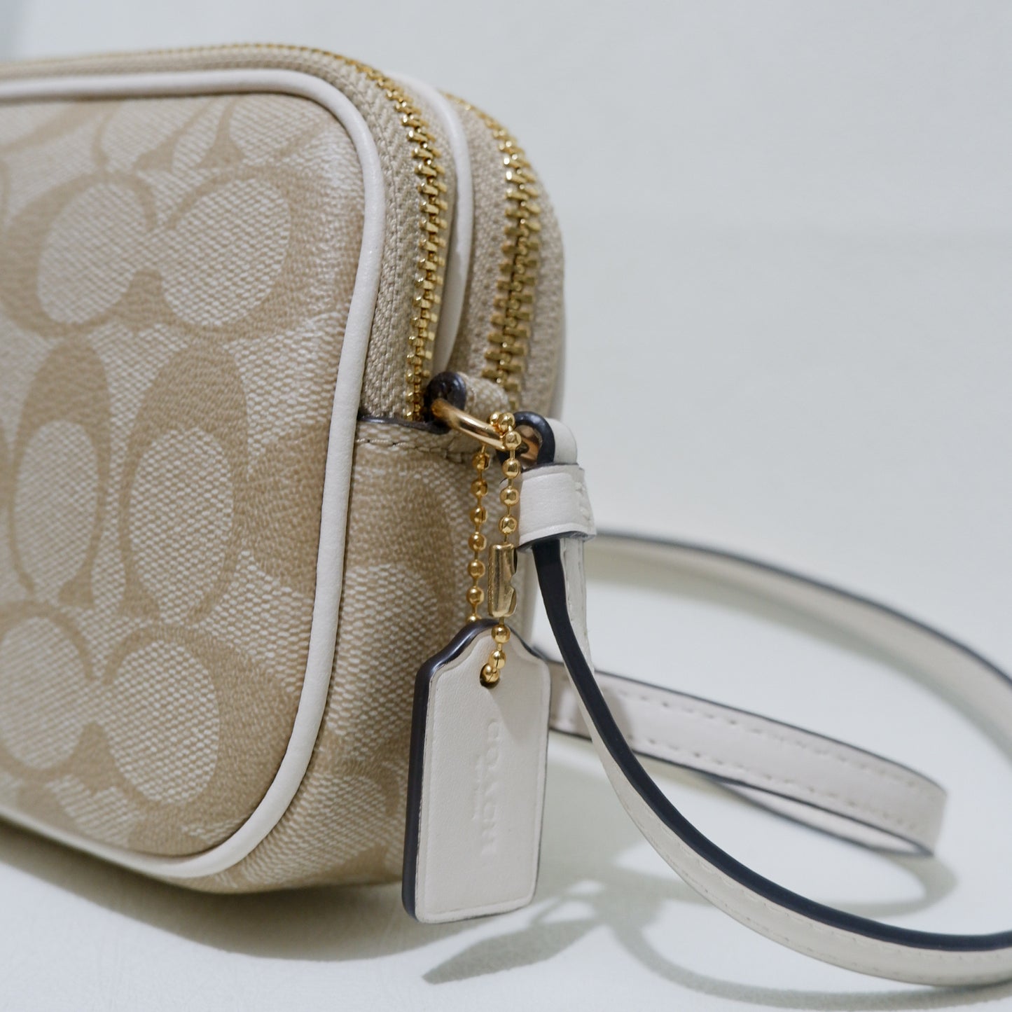 Double Zip Crossbody Pouch in Light Khaki Chalk Signature Canvas